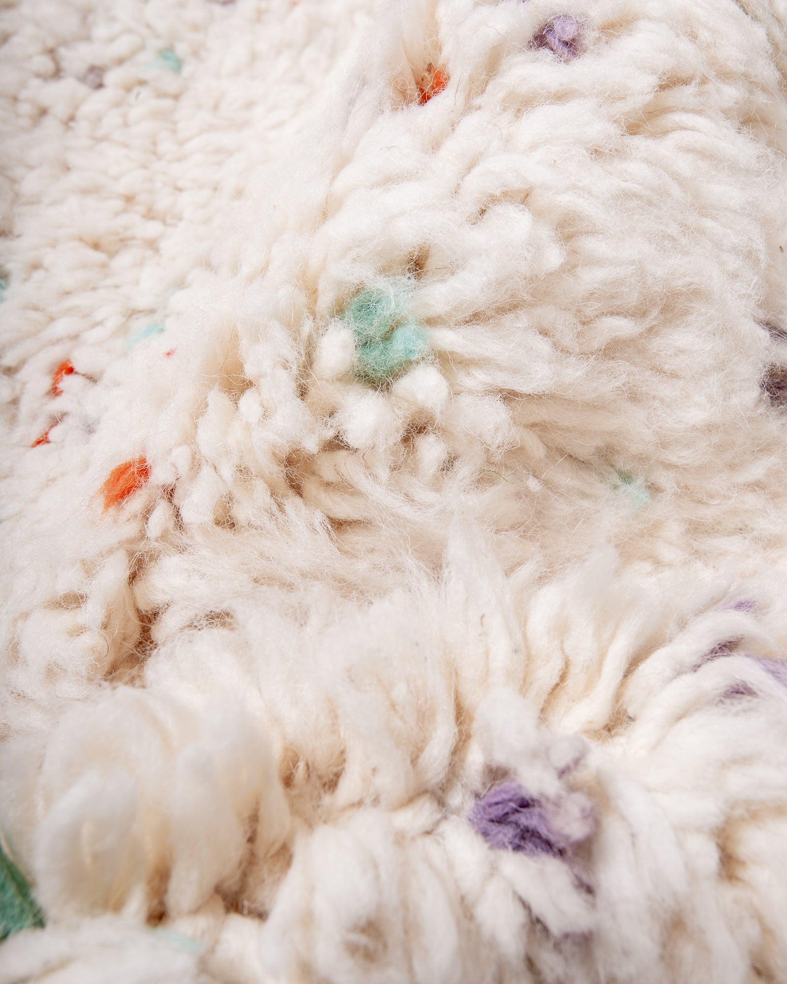 Modern, designer, handcrafted Berber rug from Morocco. Beniourain carpet with beautiful colours and patterns and fluffy wool texture.